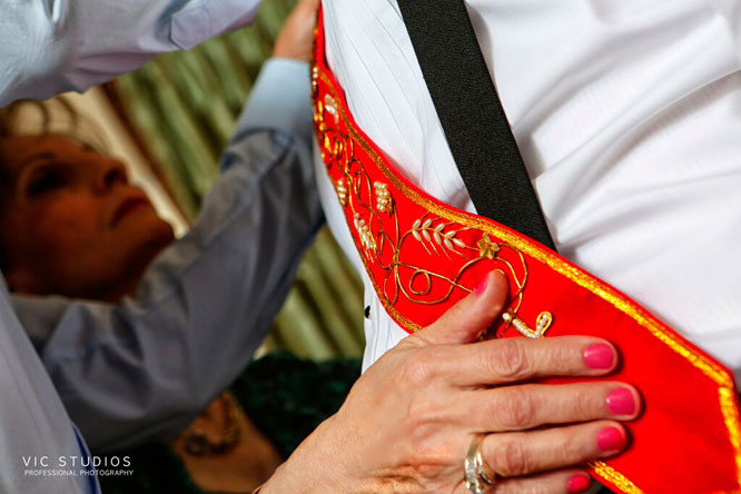 red and green ribbon ceremony